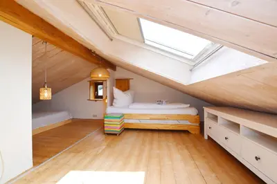 Ein Bett oder Betten in einem Zimmer der Unterkunft Schneckenhaus