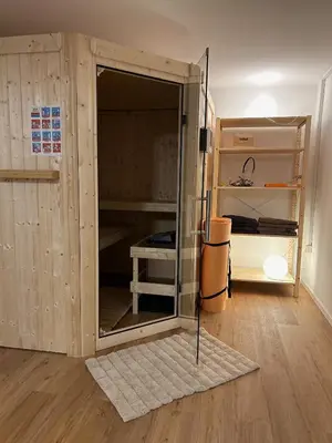 Ein Bett oder Betten in einem Zimmer der Unterkunft Ferienhaus Baron mit eigener Sauna