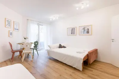 Ein Bett oder Betten in einem Zimmer der Unterkunft Wohnung im Herzen Münchens