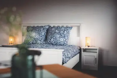 Ein Bett oder Betten in einem Zimmer der Unterkunft Kinsau Rooms