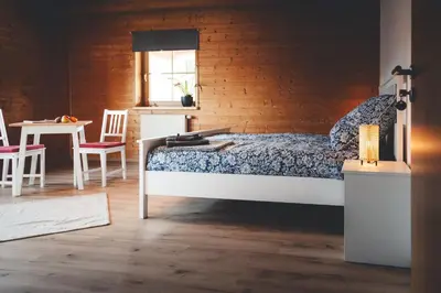 Ein Bett oder Betten in einem Zimmer der Unterkunft Kinsau Rooms