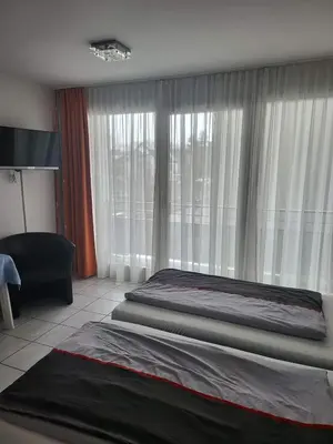 Ein Bett oder Betten in einem Zimmer der Unterkunft Wirt an der Vils