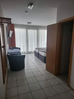 Ein Bett oder Betten in einem Zimmer der Unterkunft Wirt an der Vils