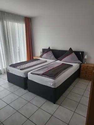 Ein Bett oder Betten in einem Zimmer der Unterkunft Wirt an der Vils