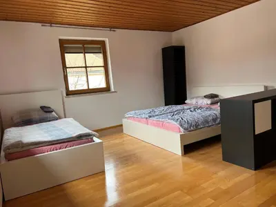 Ein Bett oder Betten in einem Zimmer der Unterkunft Ferienplatzl 90m2