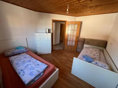 Ein Bett oder Betten in einem Zimmer der Unterkunft Ferienplatzl 90m2