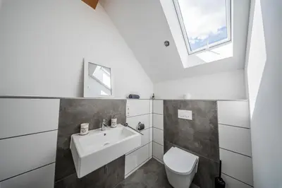 Ein Badezimmer in der Unterkunft Ammersee Design Penthouse