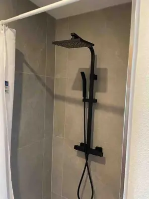 Ein Badezimmer in der Unterkunft Haus Hochland - Moderne Alpenwohnung Garten&Natur