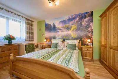 Ein Bett oder Betten in einem Zimmer der Unterkunft AlpenAppartement Traumzeit