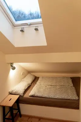 Ein Bett oder Betten in einem Zimmer der Unterkunft Ferienwohnung am Schmiedhof