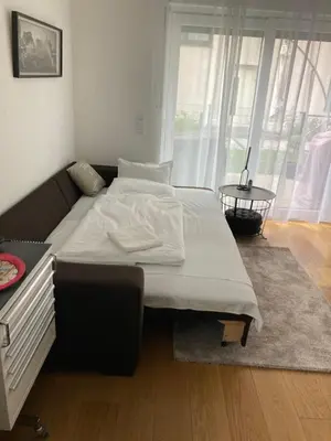 Ein Bett oder Betten in einem Zimmer der Unterkunft Casa Rumi Munich