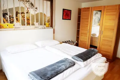 Ein Bett oder Betten in einem Zimmer der Unterkunft FeWo Schönwetter