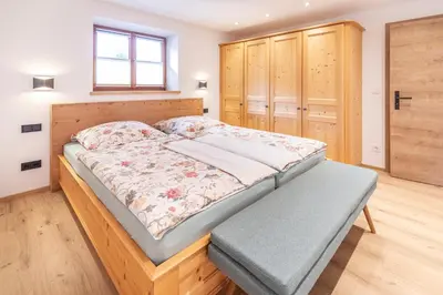 Ein Bett oder Betten in einem Zimmer der Unterkunft Gästehaus zum Thoma