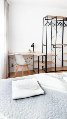 Ein Bett oder Betten in einem Zimmer der Unterkunft Moderne 3-Zimmer-Wohnung im Zentrum- Tiefgarage inklusive, Smart-TV, Shopping & Sightseeing ums Eck