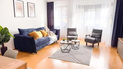 Ein Sitzbereich in der Unterkunft Moderne 3-Zimmer-Wohnung im Zentrum- Tiefgarage inklusive, Smart-TV, Shopping & Sightseeing ums Eck