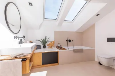 Ein Badezimmer in der Unterkunft Chiemgauloft , 5 Sterne Ferienwohnung am Chiemsee