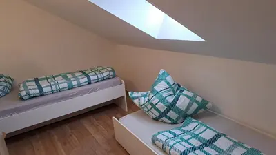 Ein Bett oder Betten in einem Zimmer der Unterkunft Neue Ferienwohnung am Ammersee