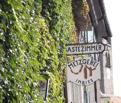 Ein Zertifikat, Auszeichnung, Logo oder anderes Dokument, das in der Unterkunft Gasthof und Metzgerei zur Post Peißenberg ausgestellt ist
