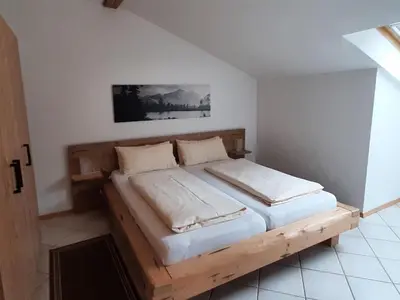 Ein Bett oder Betten in einem Zimmer der Unterkunft Apartment in Bayrischzell near Ski Lift