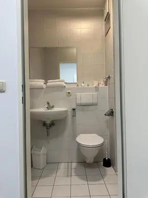 Ein Badezimmer in der Unterkunft Upper-House Goldener Hirsch