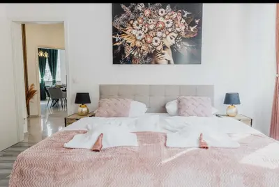 Ein Bett oder Betten in einem Zimmer der Unterkunft Ferienwohnung Zentrum Erding