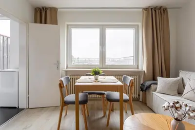 Ein Sitzbereich in der Unterkunft Global Living - Design Apartments I Terrace I Kitchen I Smart-TV I Parking space I München