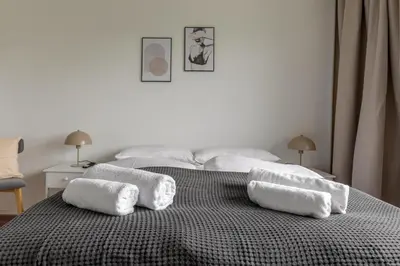 Ein Bett oder Betten in einem Zimmer der Unterkunft Global Living - Design Apartments I Terrace I Kitchen I Smart-TV I Parking space I München