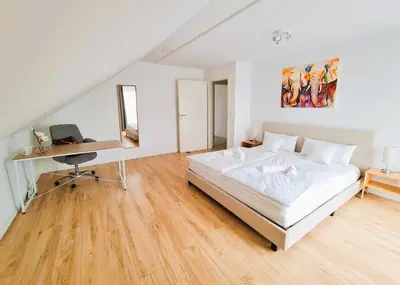 Ein Bett oder Betten in einem Zimmer der Unterkunft Apartment Nähe Airbus
