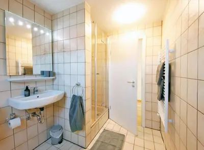 Ein Badezimmer in der Unterkunft Ferienwohnungen Roseninsel & Perle