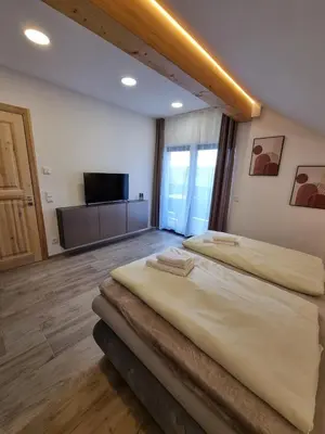 Ein Bett oder Betten in einem Zimmer der Unterkunft Ferienwohnung Bauer