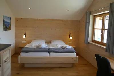 Ein Bett oder Betten in einem Zimmer der Unterkunft Beim Winkel Max