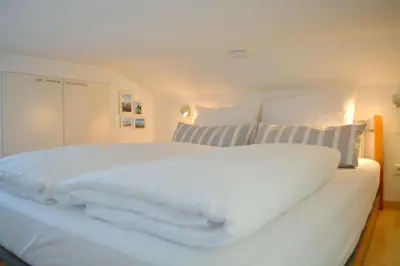 Ein Bett oder Betten in einem Zimmer der Unterkunft Haus Sandra