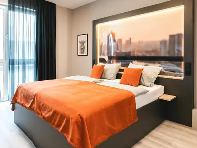 Ein Bett oder Betten in einem Zimmer der Unterkunft JustStay München Hotel & Apartments