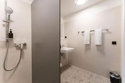 Ein Badezimmer in der Unterkunft JustStay München Hotel & Apartments