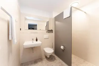 Ein Badezimmer in der Unterkunft JustStay München Hotel & Apartments