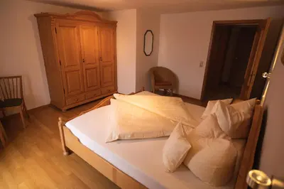 Ein Bett oder Betten in einem Zimmer der Unterkunft Schererhof