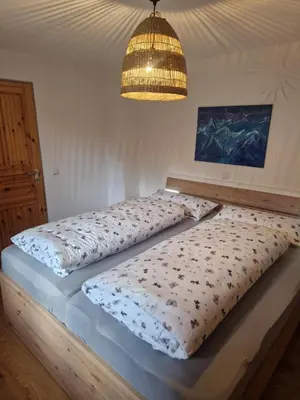 Ein Bett oder Betten in einem Zimmer der Unterkunft Sonnseitn FW