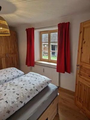 Ein Bett oder Betten in einem Zimmer der Unterkunft Sonnseitn FW