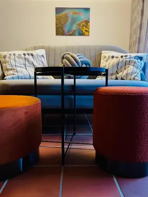 Ein Sitzbereich in der Unterkunft Ferienwohnung Theresia