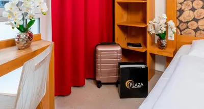 Ein Bett oder Betten in einem Zimmer der Unterkunft PLAZA INN Dachau - München