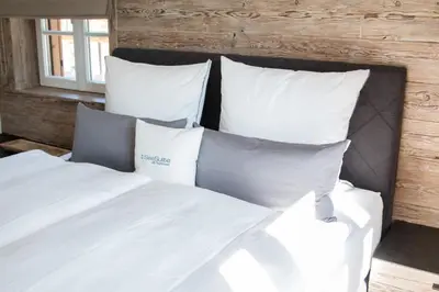Ein Bett oder Betten in einem Zimmer der Unterkunft Ferienwohnung SeeSuite