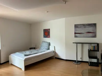 Ein Bett oder Betten in einem Zimmer der Unterkunft Apartment Weßling