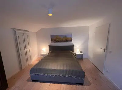 Ein Bett oder Betten in einem Zimmer der Unterkunft NEU - traumhafte Ferienwohnung mit Bergblick