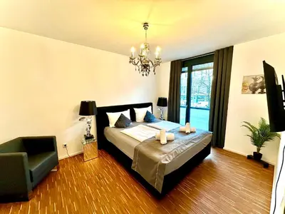 Ein Bett oder Betten in einem Zimmer der Unterkunft BeeFree City Connect Metro Bus Shops Olympia