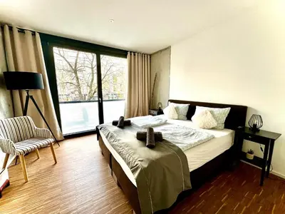 Ein Bett oder Betten in einem Zimmer der Unterkunft BeeFree City Connect Metro Bus Shops Olympia