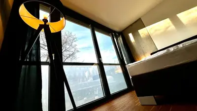 Ein Bett oder Betten in einem Zimmer der Unterkunft BeeFree City Connect Metro Bus Shops Olympia