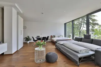 Ein Sitzbereich in der Unterkunft Moderne Studio-Wohnung - Lichtblick