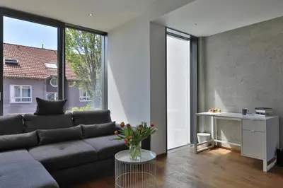 Ein Sitzbereich in der Unterkunft Moderne Studio-Wohnung - Lichtblick