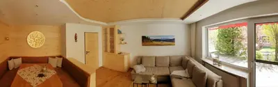 Ein Sitzbereich in der Unterkunft Ferienwohnung Stubengold