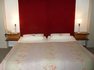 Ein Bett oder Betten in einem Zimmer der Unterkunft Hotel am Fluss